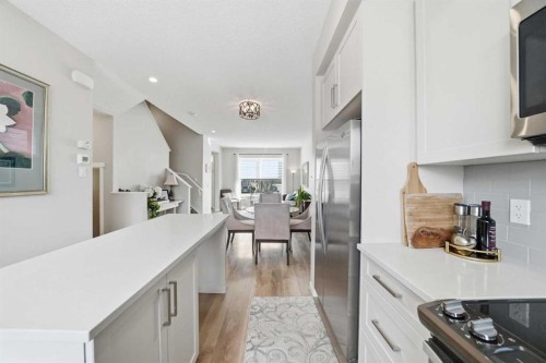 8112 Masters Boulevard Se, Calgary, AB - Indoor Photo Showing Kitchen With Upgraded Kitchen