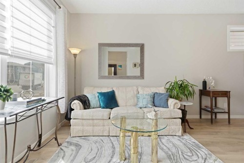 8112 Masters Boulevard Se, Calgary, AB - Indoor Photo Showing Living Room