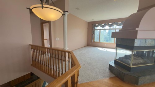 117 Woodpark Close Sw, Calgary, AB - Indoor Photo Showing Other Room