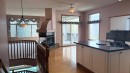 117 Woodpark Close Sw, Calgary, AB  - Indoor With Fireplace 