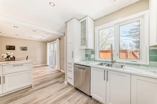 8-714 Willow Park Drive Se, Calgary, AB - Indoor Photo Showing Kitchen With Double Sink With Upgraded Kitchen