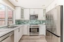 8-714 Willow Park Drive Se, Calgary, AB  - Indoor Photo Showing Kitchen With Stainless Steel Kitchen With Double Sink With Upgraded Kitchen 