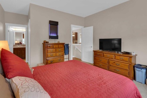 129 Fireside Place, Cochrane, AB - Indoor Photo Showing Bedroom