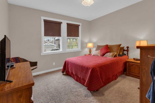 129 Fireside Place, Cochrane, AB - Indoor Photo Showing Bedroom