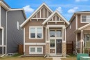 129 Fireside Place, Cochrane, AB  - Outdoor With Facade 