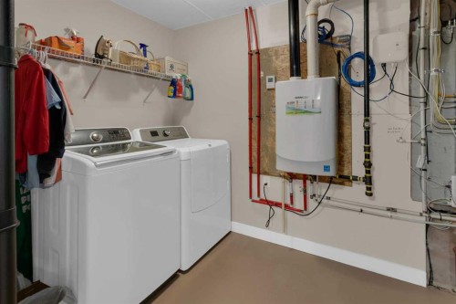 129 Fireside Place, Cochrane, AB - Indoor Photo Showing Laundry Room