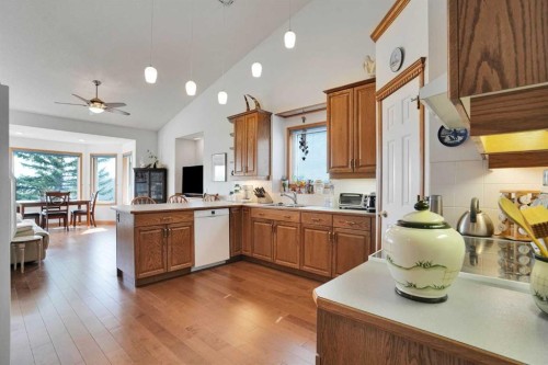 82 Valley Ridge Point Nw, Calgary, AB - Indoor Photo Showing Kitchen With Double Sink