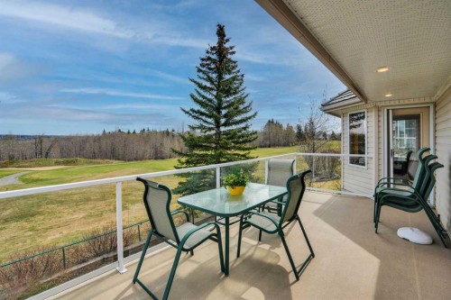 82 Valley Ridge Point Nw, Calgary, AB - Outdoor With Deck Patio Veranda With View With Exterior