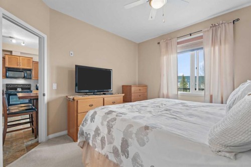 215-43 Sunrise Loop Se, High River, AB - Indoor Photo Showing Bedroom