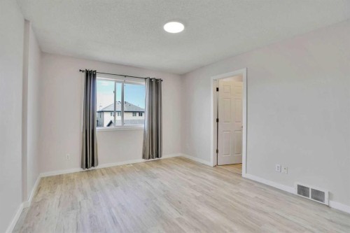 19 Taravista Gardens Ne, Calgary, AB - Indoor Photo Showing Other Room