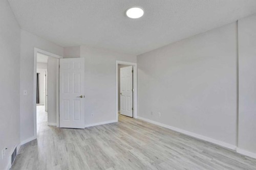 19 Taravista Gardens Ne, Calgary, AB - Indoor Photo Showing Other Room