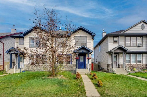 19 Taravista Gardens Ne, Calgary, AB - Outdoor With Facade