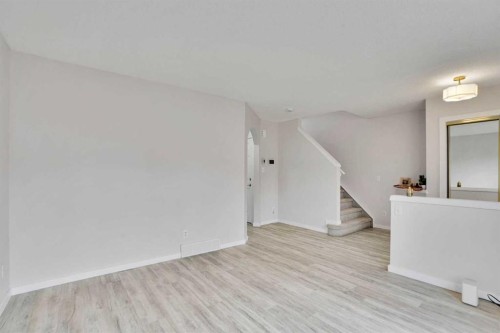 19 Taravista Gardens Ne, Calgary, AB - Indoor Photo Showing Other Room
