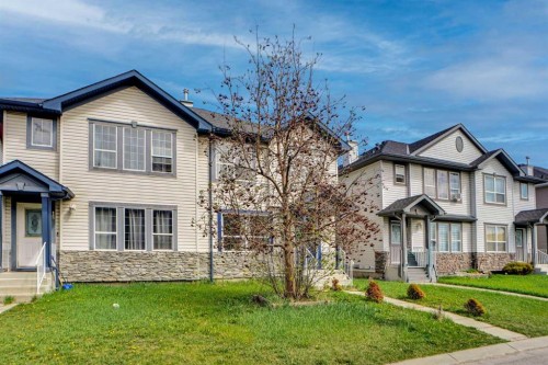 19 Taravista Gardens Ne, Calgary, AB - Outdoor With Facade