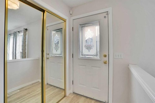 19 Taravista Gardens Ne, Calgary, AB - Indoor Photo Showing Other Room