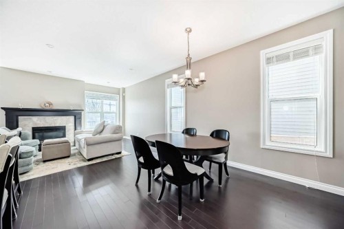 46 Nolanfield Road Nw, Calgary, AB - Indoor Photo Showing Other Room With Fireplace
