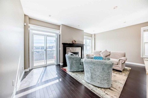 46 Nolanfield Road Nw, Calgary, AB - Indoor Photo Showing Living Room With Fireplace