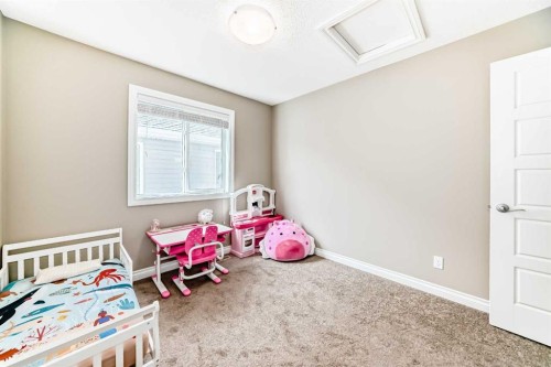 46 Nolanfield Road Nw, Calgary, AB - Indoor Photo Showing Bedroom
