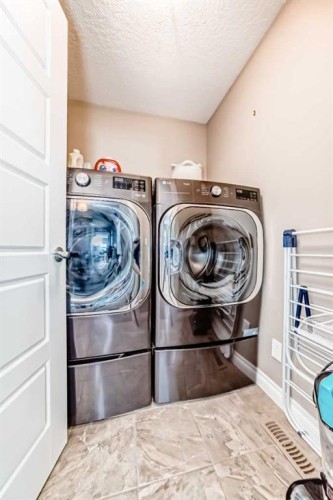 46 Nolanfield Road Nw, Calgary, AB - Indoor Photo Showing Laundry Room