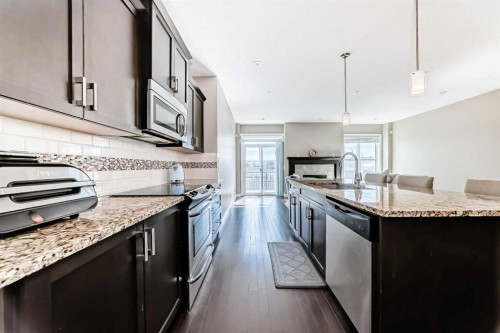 46 Nolanfield Road Nw, Calgary, AB - Indoor Photo Showing Kitchen With Stainless Steel Kitchen With Upgraded Kitchen