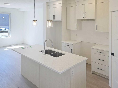 1973 Mccaskill Drive, Crossfield, AB - Indoor Photo Showing Kitchen With Double Sink