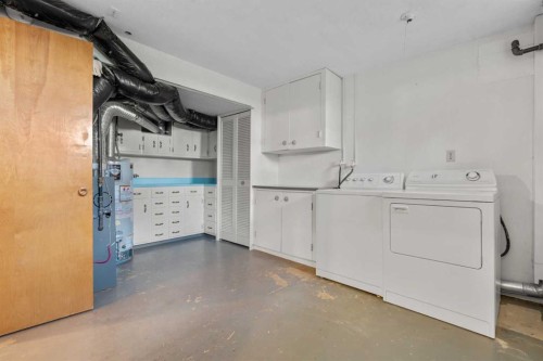 444 Woodland Crescent Se, Calgary, AB - Indoor Photo Showing Laundry Room