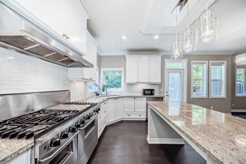 173 Aspenshire Drive Sw, Calgary, AB - Indoor Photo Showing Kitchen With Upgraded Kitchen