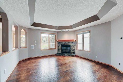 91 Valley Ridge Green Nw, Calgary, AB - Indoor Photo Showing Living Room With Fireplace