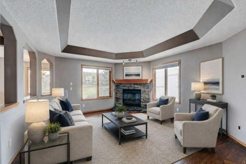 91 Valley Ridge Green Nw, Calgary, AB - Indoor Photo Showing Living Room With Fireplace