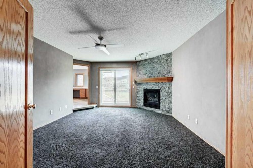 91 Valley Ridge Green Nw, Calgary, AB - Indoor With Fireplace