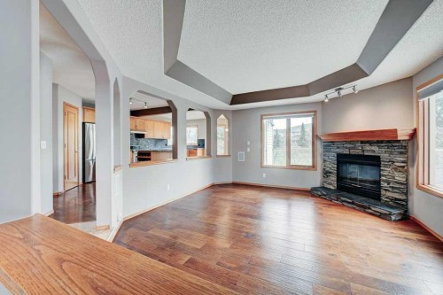 91 Valley Ridge Green Nw, Calgary, AB - Indoor Photo Showing Living Room With Fireplace