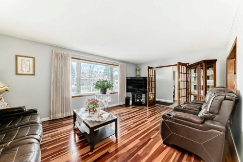 247 Huntford Way Ne, Calgary, AB - Indoor Photo Showing Living Room