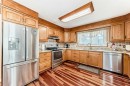247 Huntford Way Ne, Calgary, AB  - Indoor Photo Showing Kitchen With Stainless Steel Kitchen 