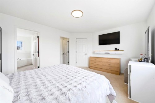 193 Hidden Creek Road Nw, Calgary, AB - Indoor Photo Showing Bedroom
