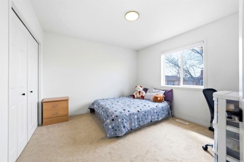 193 Hidden Creek Road Nw, Calgary, AB - Indoor Photo Showing Bedroom