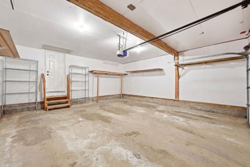 193 Hidden Creek Road Nw, Calgary, AB - Indoor Photo Showing Garage