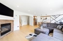 193 Hidden Creek Road Nw, Calgary, AB  - Indoor Photo Showing Living Room With Fireplace 