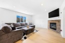 193 Hidden Creek Road Nw, Calgary, AB  - Indoor Photo Showing Living Room With Fireplace 