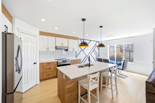 193 Hidden Creek Road Nw, Calgary, AB - Indoor Photo Showing Kitchen With Upgraded Kitchen