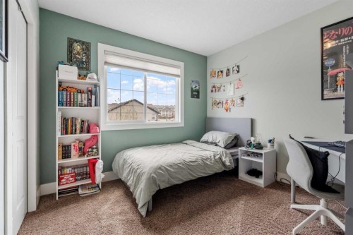 10 Heritage View, Cochrane, AB - Indoor Photo Showing Bedroom