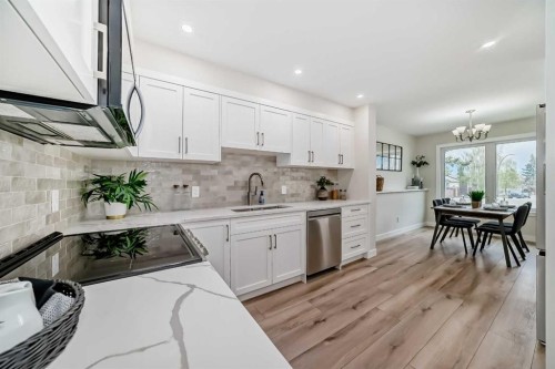 80 Coachway Gardens Sw, Calgary, AB - Indoor Photo Showing Kitchen
