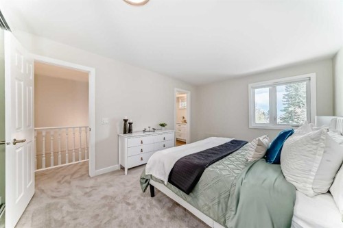 80 Coachway Gardens Sw, Calgary, AB - Indoor Photo Showing Bedroom