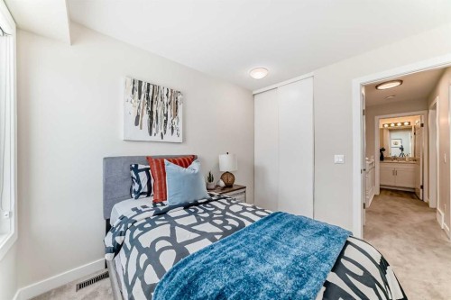 80 Coachway Gardens Sw, Calgary, AB - Indoor Photo Showing Bedroom