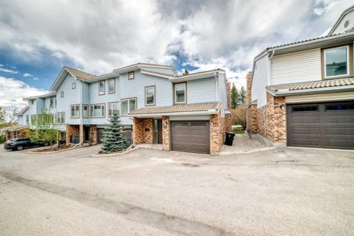 80 Coachway Gardens Sw, Calgary, AB - Outdoor With Facade