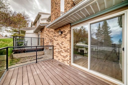 80 Coachway Gardens Sw, Calgary, AB - Outdoor With Deck Patio Veranda With Exterior