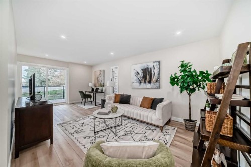 80 Coachway Gardens Sw, Calgary, AB - Indoor Photo Showing Living Room
