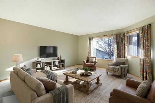 8-118 Strathcona Road Sw, Calgary, AB - Indoor Photo Showing Living Room