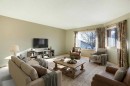 8-118 Strathcona Road Sw, Calgary, AB  - Indoor Photo Showing Living Room 