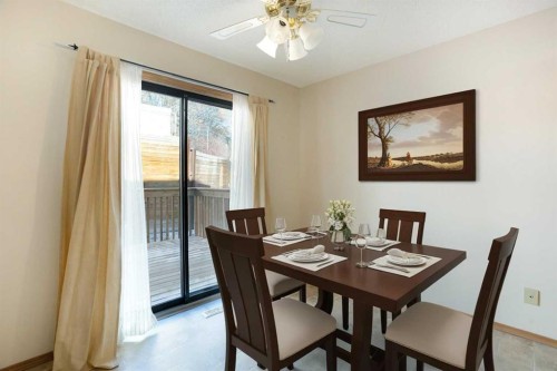 8-118 Strathcona Road Sw, Calgary, AB - Indoor Photo Showing Dining Room