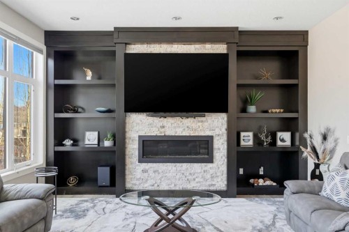 75 Aspen Summit Court Sw, Calgary, AB - Indoor Photo Showing Living Room With Fireplace